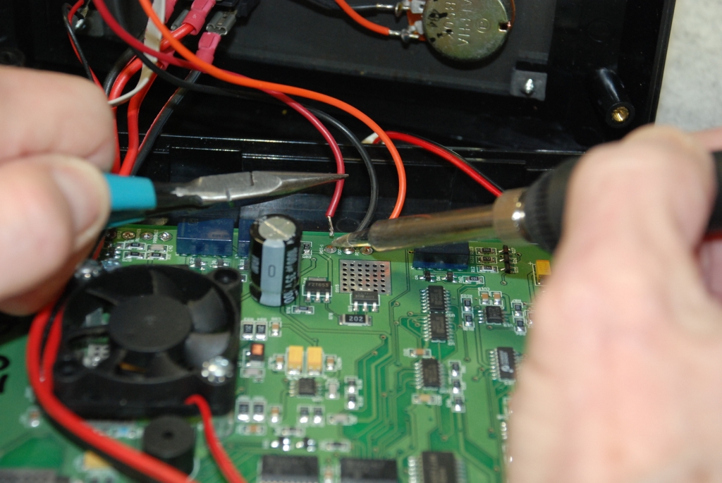 Unsoldering the potentiometer wires.