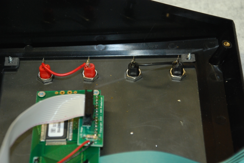 Handheld electrode jacks after wire removal.