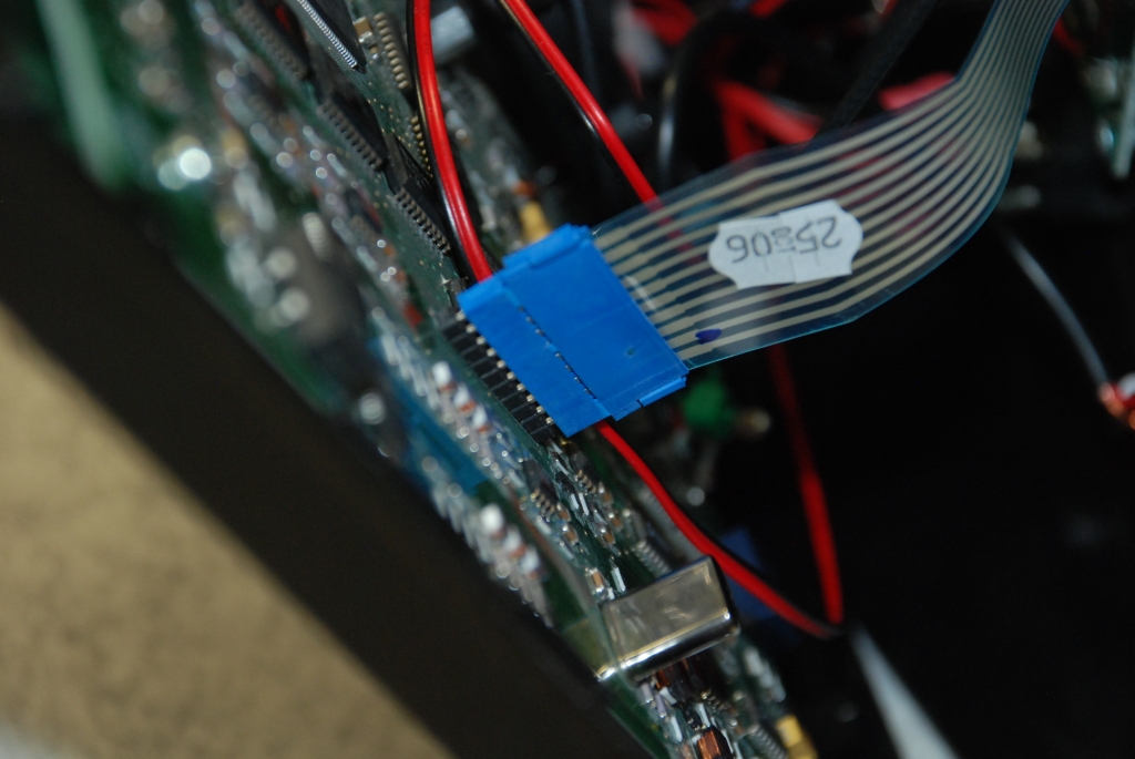 Pressing the keyboard connector down.
